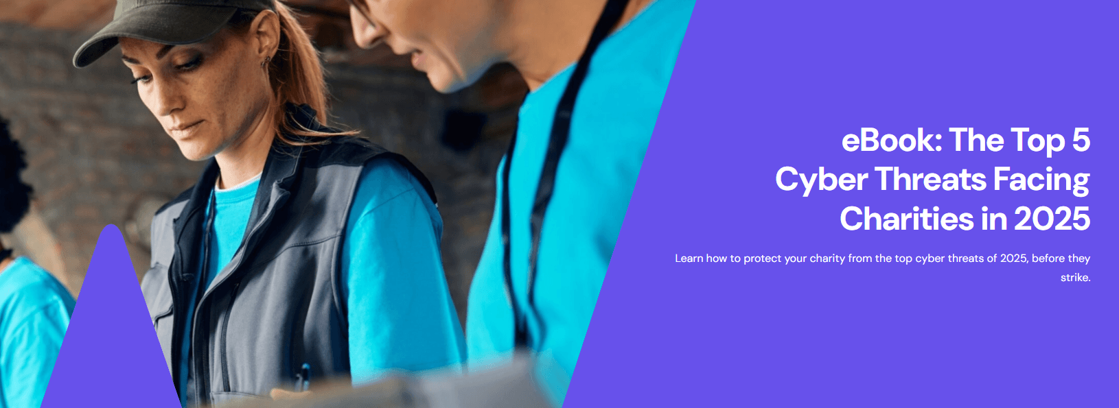 People in blue shirts working together; text reads "eBook: The Top 5 Cyber Threats Facing Charities in 2025."